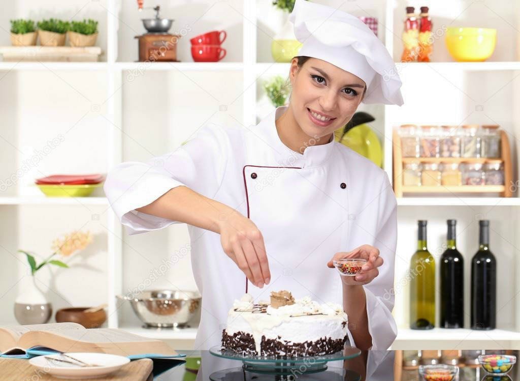 depositphotos_19086997-stock-photo-young-woman-chef-cooking-cake-cooking